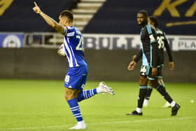 Josh Magennis celebrates one of his hat-trick against Leicester Under-21s in the EFL Trophy