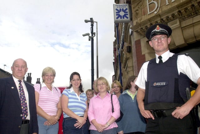 2002- Pubwatch scheme launch in Wigan town centre with licensees with a police officer.