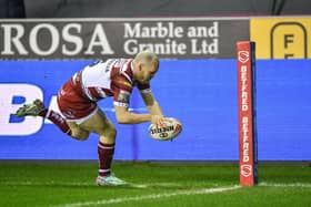 Liam Marshall scored a hat-trick in Wigan's victory over Huddersfield