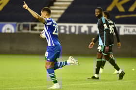 Josh Magennis celebrates the first of his hat-trick for Latics in the 7-1 thrashing of Leicester City Under-21s