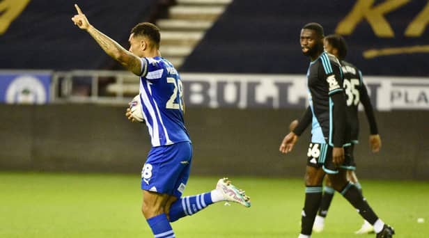 Josh Magennis celebrates the first of his hat-trick for Latics in the 7-1 thrashing of Leicester City Under-21s