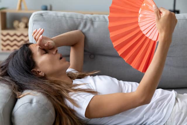 Use a hand or electric fan to keep cool and take on plenty of fluids