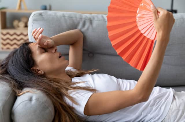 Use a hand or electric fan to keep cool and take on plenty of fluids