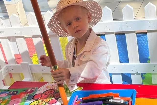 Three-year-old Scarlett Chapman enjoys colouring
