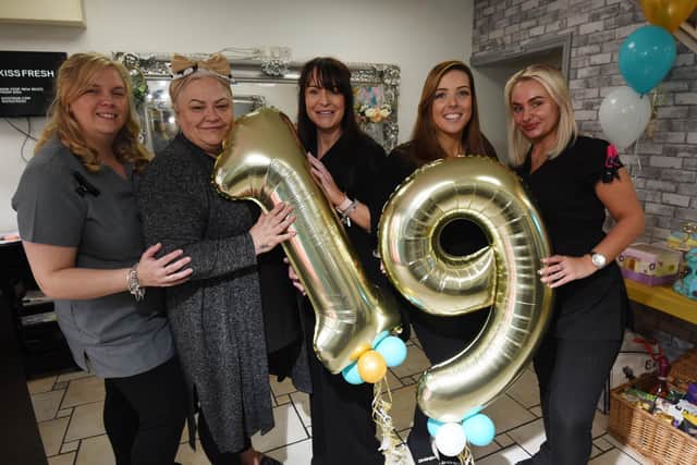 Staff members from left, Kathryn Sutton, Nicola Chatterley, salon owner Donna Denton, Chelsea Clinton and Megan Hunt - Wigan hair salon celebrates 19 years in business.  Staff and clients gather to celebrate at Tyler Lee Hair Company, Ormskirk Road, Pemberton.