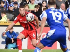 Charlie Hughes says Latics are determined to bounce back this weekend against League One leaders Portsmouth