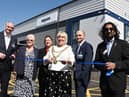 The Mayor of Wigan Coun Marie Morgan, centre, cuts the ribbon to officially open Algeco, Europe's leading modular and offsite building solutions brand, on the former site of Morrisons supermarket, Ince, Wigan.