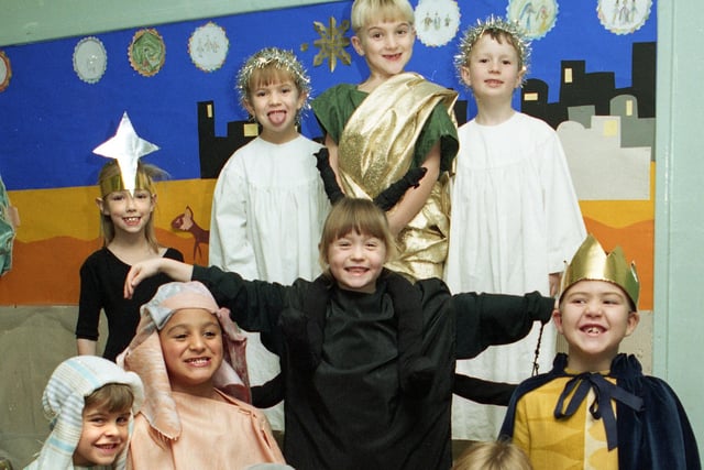 Infants of Lamberhead Green Primary School with their nativity "Spiders First Christmas" in December 1995.