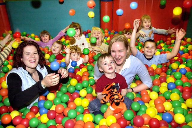 Having a ball.....The Playroom's 50,00th customer, Rhys Hickman, and his mum, Kelly, celebrate with friends at the Wiend centre after being presented with lifetime membership of the Playroom, a tigger cuddly toy and Bob the Builder toy on Tuesday 2nd of April 2002. 