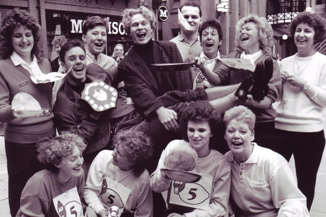 Pancake tossing competitors in The Galleries, Wigan, in 1989.