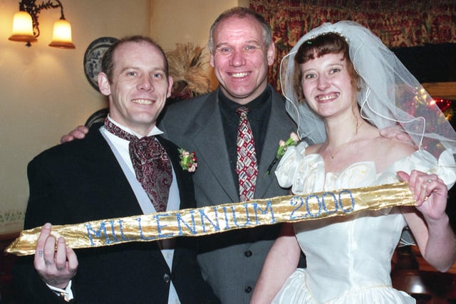 Sarah Davies and Stephen Harrison, from Winstanley, who were married on New Years Day 2000 by Stephen's brother William, centre, at Pemberton Christian Centre.
Wigan Register Office was closed but William, who was a registrar, stepped in and conducted the Millennium service.