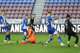 Jason Kerr and Sam Tickle are powerless to prevent Lincoln's late equaliser at the Brick