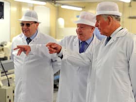 HRH Prince Charles visits the Wm Santus factory in Wigan, makers of the famous Uncle Joe's  Mintballs with John and Anthony Winnard. Picture by Paul Heyes, Wednesday April 03, 2019.