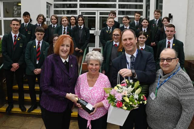 Lunchtime supervisor Audrey Roberts says goodbye to pupils and Makerfield MP Yvonne Fovargue, headteacher Mark Dumican and chairman of governors Steve Westhead