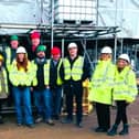 Members of Wigan's scrutiny committee at Haigh Hall following their journey by public transport