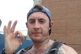 Aaron doing the well-known Andy's Man Club pose.
