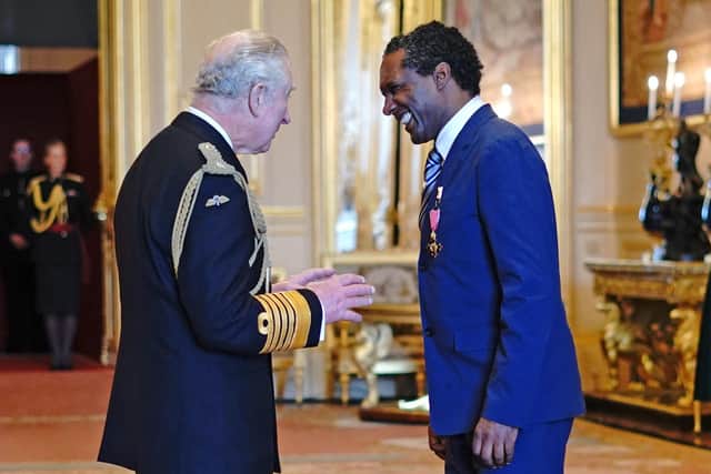 Lemn Sissay with Prince Charles during the investiture