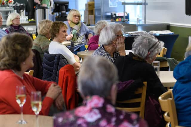 Guests listen in as Rhona Whiteford reads a chapter from her new book A Legacy of Ghosts