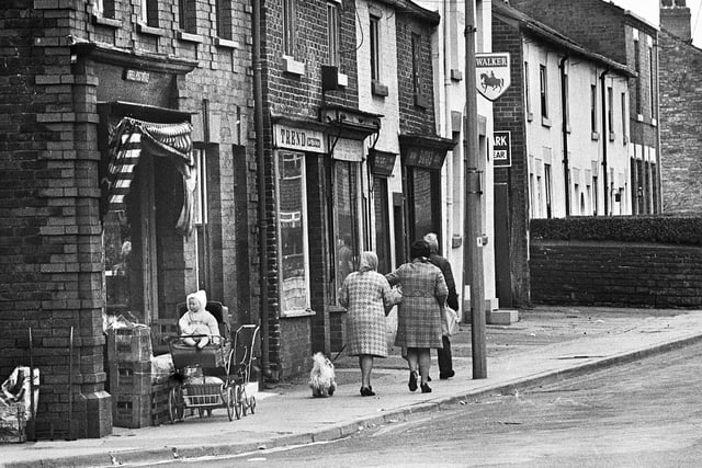 Church Street, Orrell, at its junction with Moor Road in 1973. The post office and general store is on the left corner with a row of shops then the Rose and Crown pub.
