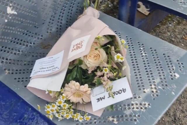 Michaela Taylor found flowers at Gathurst railway station, which had been left there by Sarah McCaig, from Olive Owl Flowers