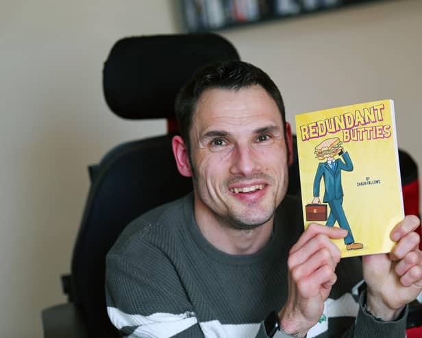 Wigan poet Shaun Fallows with his new book Redundant Butties, his third book of poems