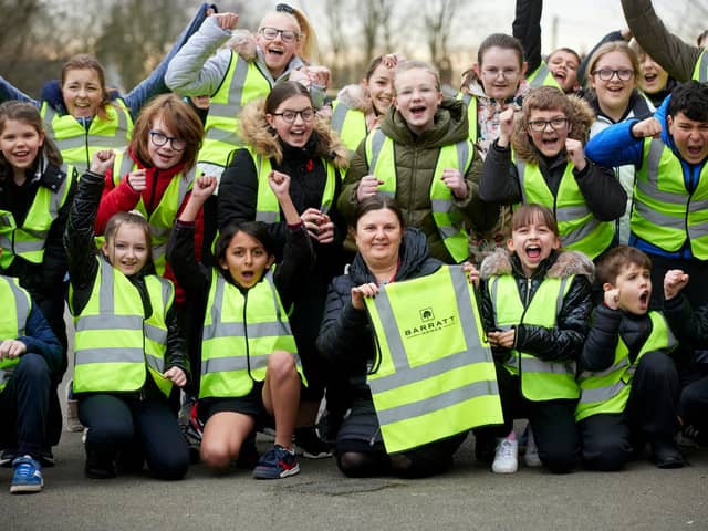 Year six pupils at Hindley Junior and Infant School with the new vests
