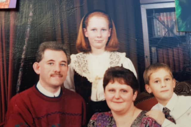 Paula as a young girl with dad Russell Carbery, mum Anne and brother Stuart.