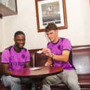 Christian Saydee (left) and Dara Costelloe (right) model Wigan Athletic's new third kit