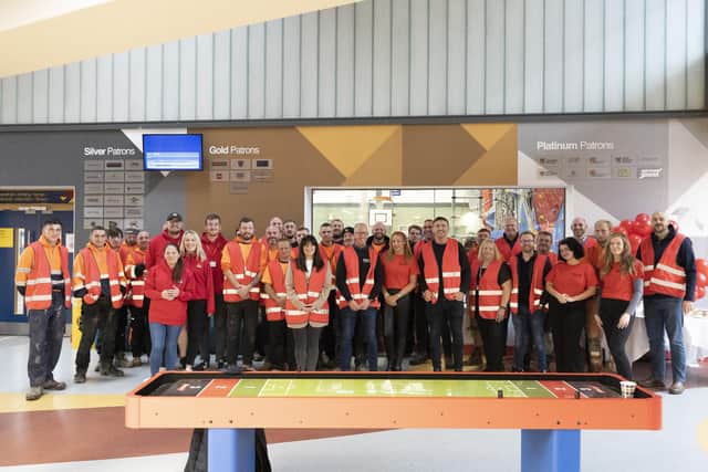 MAC Construction staff wore red high-visibility bibs to support Wigan Youth Zone