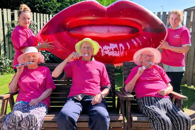 Residents and staff at Shawcross care home learn about good oral hygiene at a "TEAth" party