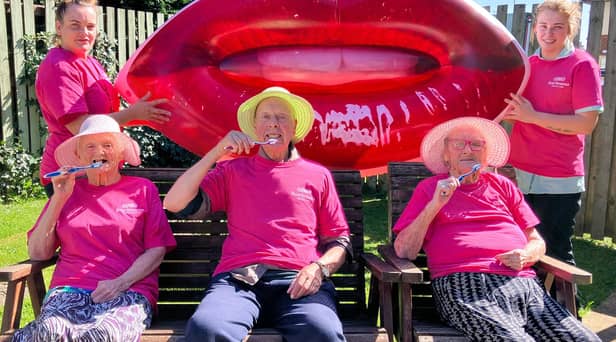 Residents and staff at Shawcross care home learn about good oral hygiene at a "TEAth" party
