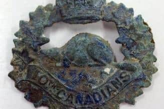 One of Private Harry Atherton's badges found with his remains.