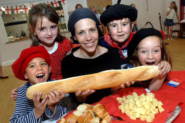 2006 - French ambassadress from Angers, Claire Lemonnier, joins Woodfield Primary School pupils, left to right, Nicholas Hough, Amy Seabrook, Will Kyle and Anna Porter sampling continental fare during a French Day at the Wigan Lane school.