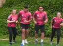 Wigan Race for Life at Haigh Woodland Park. Wigan Warriors L-R Rachel Thompson, Patrick Mago, Liam Byrne and Georgia Wilson.