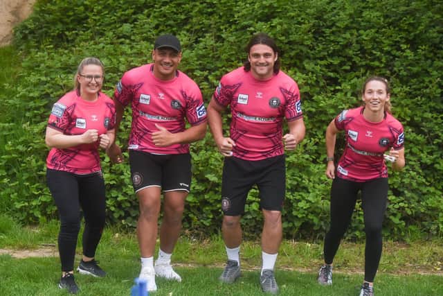 Wigan Race for Life at Haigh Woodland Park. Wigan Warriors L-R Rachel Thompson, Patrick Mago, Liam Byrne and Georgia Wilson.