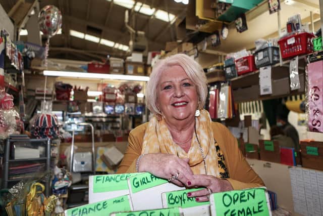 Christine Grundy, 65, who works at E and J Cards in Spinning Gate Market.
