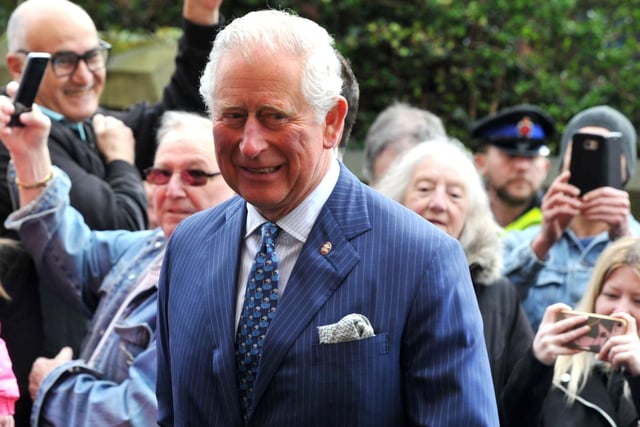 Prince Charles meets the crowds of people outside The Old Courts, Wigan - HRH Prince Charles visits Wigan Little Theatre as well as Uncle Joe's Mint Ball factory and The Old Courts, Wigan, April 2019.
