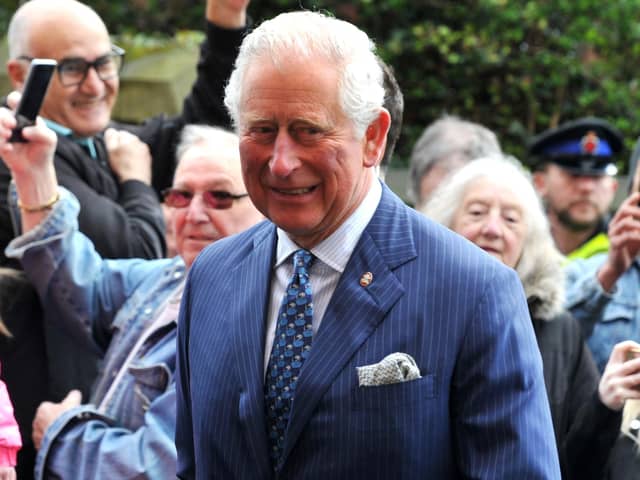 Prince Charles meets the crowds of people outside The Old Courts, Wigan - HRH Prince Charles visits Wigan Little Theatre as well as Uncle Joe's Mint Ball factory and The Old Courts, Wigan, April 2019.
