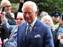 Prince Charles meets the crowds of people outside The Old Courts, Wigan - HRH Prince Charles visits Wigan Little Theatre as well as Uncle Joe's Mint Ball factory and The Old Courts, Wigan, April 2019.