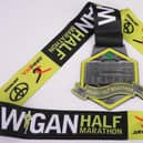 The half marathon medal at the 2024 Run Wigan Festival