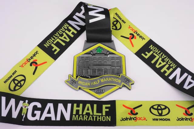 The half marathon medal at the 2024 Run Wigan Festival