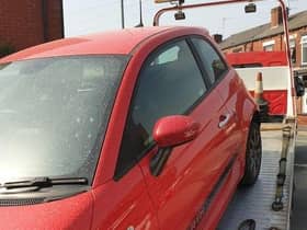 The suspicious car is put onto a low-loader in Abram
