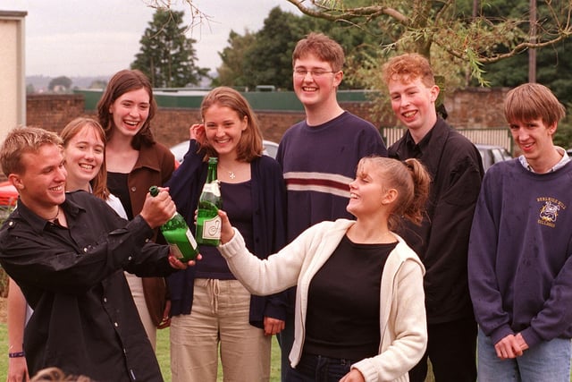 Hannah, second left, celebrates with fellow students, who all gained  5 A Grade "A" Levels, Judith Whiteley, Hannah, Andrew Davies, Paul Glaysher, Michael Hendry, Philip Palmer, Louise Halliwell and Jennifer Swindlehurst.