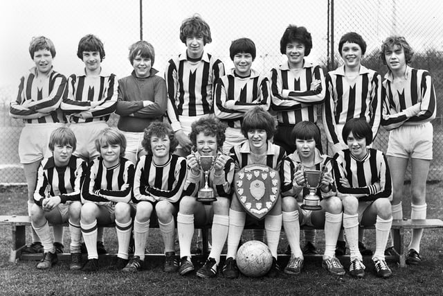 The Shevington High School Under 13s football team with trophies in April 1980.
They had won the Lancashire Evening Post Trophy as champions of the Wigan Metro Schools League, the schools 5-a-side final and shared the Lythgoe Knock-Out Cup with St. Thomas More RC High School. 