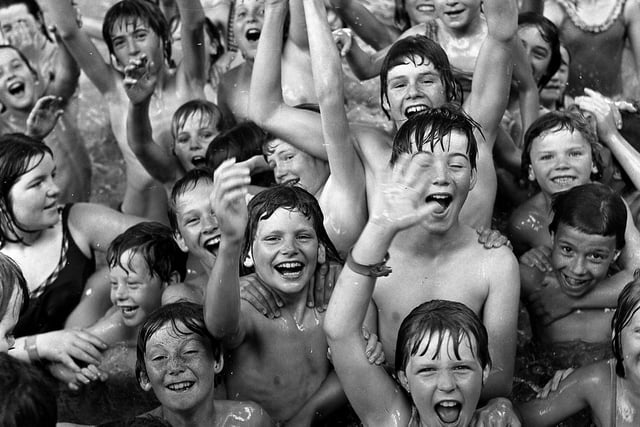 RETRO 1976 Lots of fun for youngsters enjoying Hindley swimming pool.