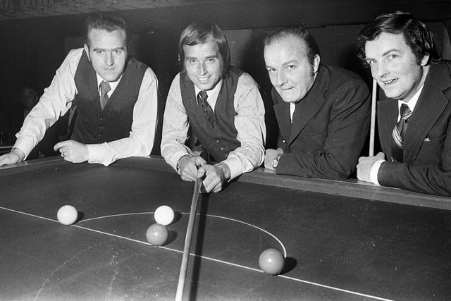 World snooker champion of 1969, 1971 and 1977 John Spencer, 2nd left, ready to play an exhibition match at the old Ashton Baths on the Friday night of 14th of September 1973.
