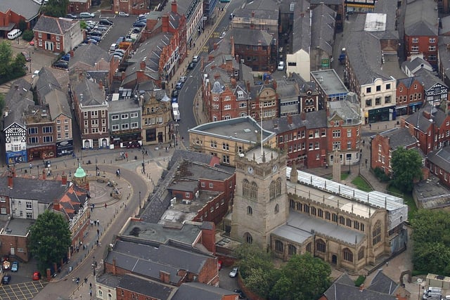 WIGAN AERIAL PICTURES - Wigan Parish Church and surrounding areas of Wigan town centre, including Market Street, Market Place, Library Street and Hallgate.