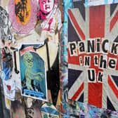A piece of coronavirus COVID-19 themed street art graffiti is pictured in East London during the novel coronavirus COVID-19 pandemic (Photo: GLYN KIRK/AFP via Getty Images)