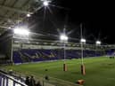 Wigan Warriors take on Warrington Wolves at the Halliwell Jones Stadium