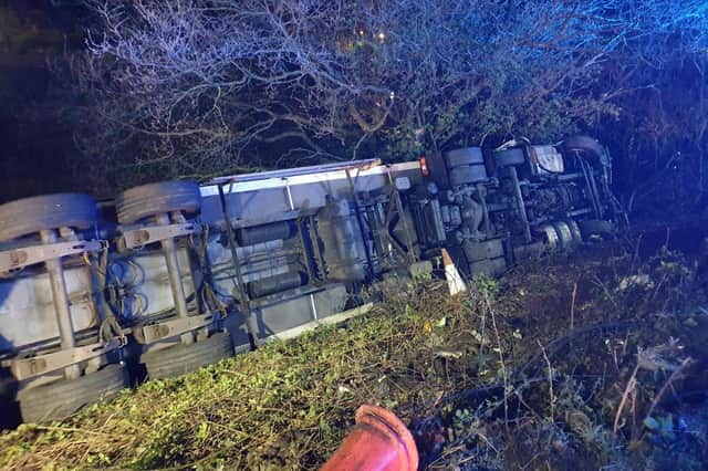 The lorry driver suffered minor injuries after overturning on the southbound M6 between junctions 23 and 24 earlier this morning